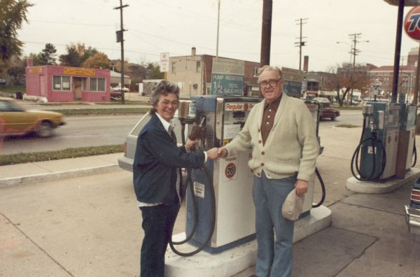 Virginia Dillman and Richard Lund, the last customer for Dillman's Service Station at 421 South Park Street.