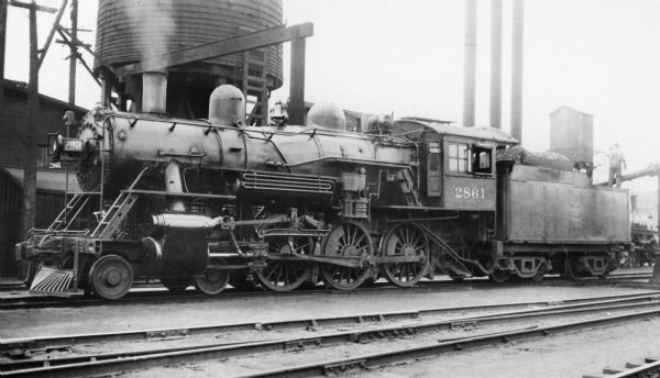 Left side view of locomotive engine no. 2861, a steam locomotive of the Chicago, Milwaukee, St. Paul and Pacific Railroad Company.