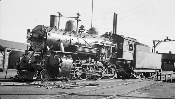 Left side view of the locomotive engine no. 2872, a steam locomotive of the Chicago, Milwaukee, St. Paul and Pacific Railroad Company.