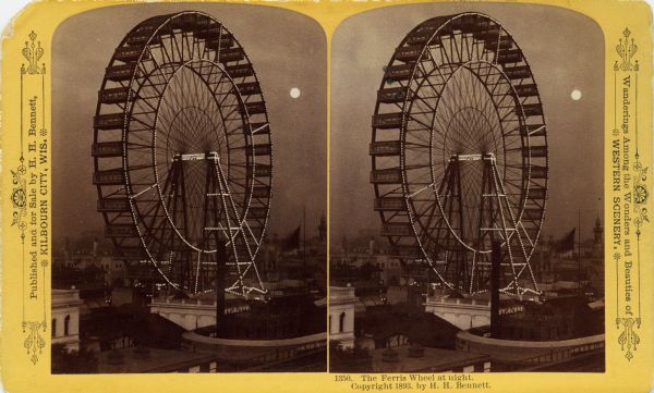Stereograph of the Ferris Wheel at the Columbian Exposition at night. A full moon can be seen to the right of the wheel. Text at right: "Wanderings Among the Wonders and Beauties of Western Scenery."