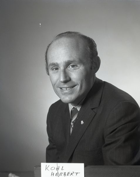 Studio portrait of Herb Kohl as President of the Kohl Corporation.