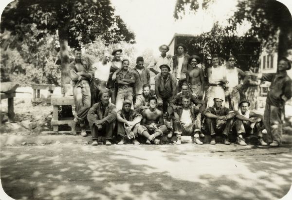 Outdoor informal group portrait of Devil's Lake State Park Civilian Conservation Corps workers.
