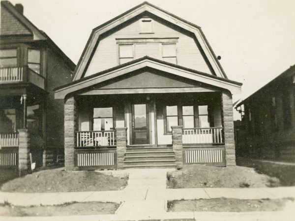 View from street of Willms home, 2025 S. 31st Street, Milwaukee. Home of Kunigunde (Dorn) Willms (1857-1941) and her daughters Anna (b. 1881) and Emma (1893-1974), after the death of their husband and father Gustav Willms (c. 1854-1917), a cigar manufacturer. This was the Willms home from 1918 to 1961.
