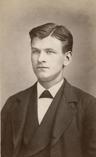 Quarter-length portrait of Gustav Willms (c. 1854-1917) of Milwaukee, Wisconsin. He was a cigar manufacturer.