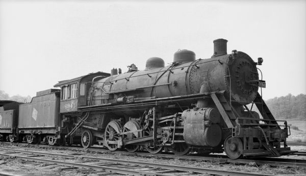 Locomotive #694 of the Chicago, Milwaukee, St. Paul and Pacific Railroad Company.