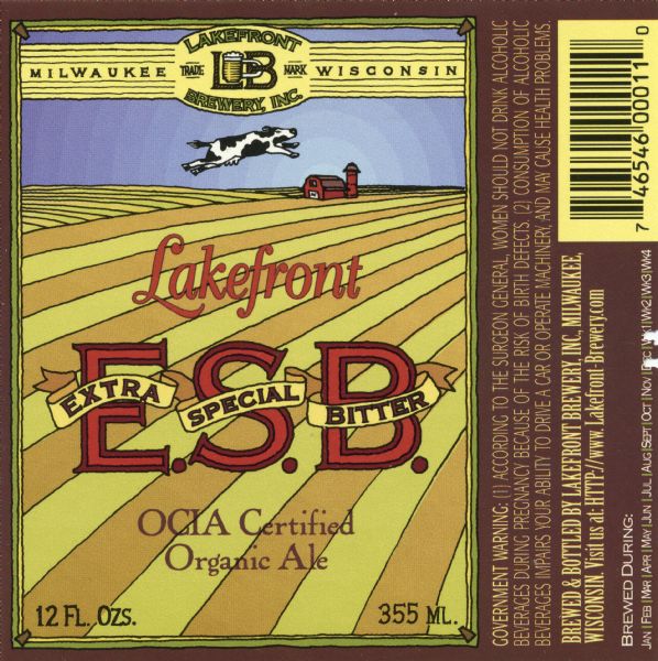 Label for Lakefront Extra Special Bitter OCIA certified organic ale. The label shows a cow leaping over a farm field with a barn and silo in the background.