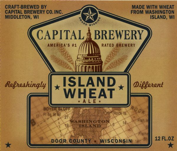 Capital Island Wheat beer label. The label features a drawing of the Wisconsin Capitol dome flanked by stalks of wheat. There is also a map of Washington Island where the wheat for the beer is grown.
