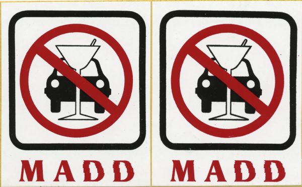 Two stickers promoting Mothers Against Drunk Driving (MADD) with a drawing of a car with a martini glass in front of it and a circle-backslash symbol (prohibition sign) over the entire image.