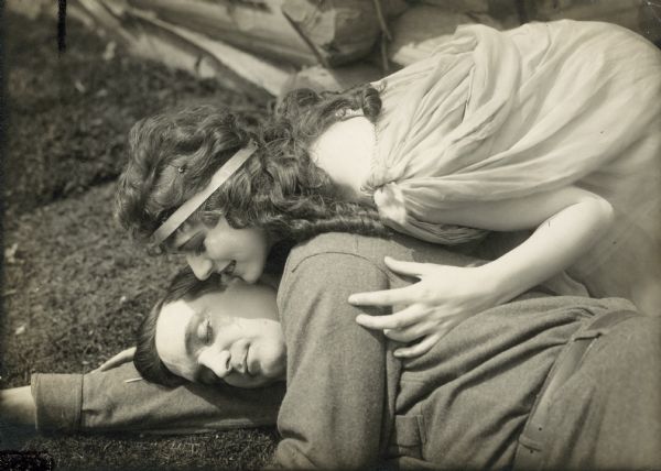Celestia the Goddess (played by Anita Stewart) embraces Tom Barclay (Earle Williams) in a production still for the Vitagraph serial "The Goddess."
