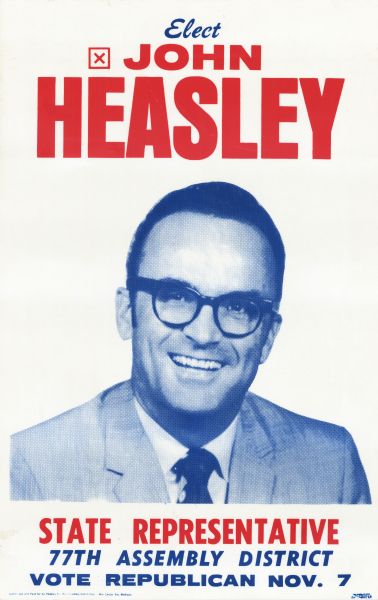 Poster supporting John Heasley for Wisconsin State Representative, in the 77th Assembly District. Features a blue image of Heasley with red text.