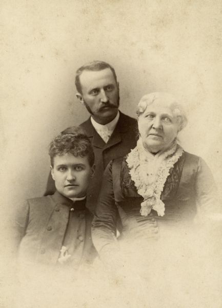 Vignetted studio portrait of, left to right, Eliza Ruhamah Scidmore, George Hawthorne Scidmore and Eliza Catherine Scidmore.