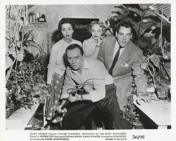 Movie still from the Allied Artists movie "Invasion of the Body Snatchers," featuring Carolyn Jones (playing "Teddy" Belicec), King Donovan (playing Jack Belicec), Dana Wynter (playing Becky Driscoll), and Kevin McCarthy (playing Dr. Miles Bennell).
