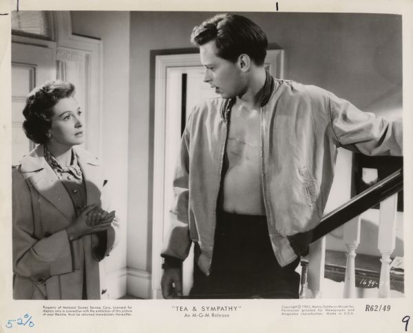 Movie still from the MGM movie "Tea & Sympathy," featuring John Kerr (playing Tom Robinson Lee) and Deborah Kerr (playing Laura Reynolds).