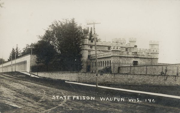 An exterior view of the Waupun State Prison. Caption reads: "State Prison, Waupun, Wis."