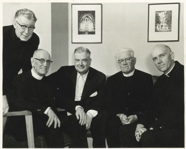 A group portrait taken at the jubilee mass and dinner in honor of Father Morgan. From left to right are Father O'Donnell, Father Morgan, Judge Robert Tehan, Bishop O'Connor (Madison), and Father Morgan's brother.