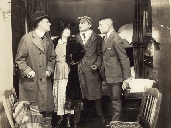 Still from the 1917 Pathé movie "Sylvia of the Secret Service," featuring Suzanne Willa (playing Fay Walling) and Erich Von Stroheim (playing Hemming).