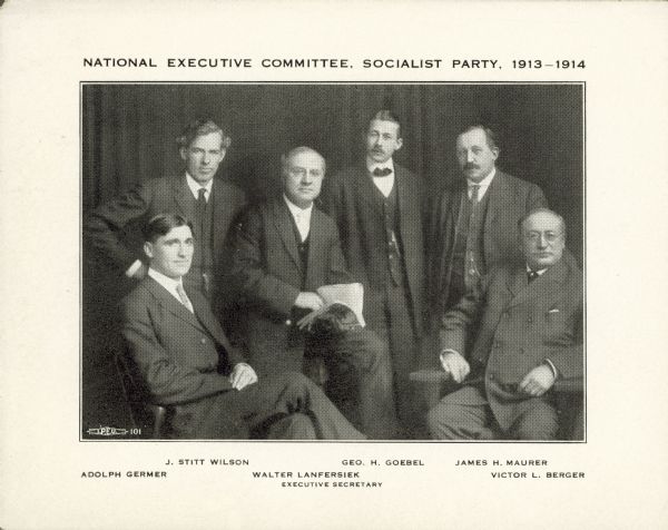 A group portrait of the Socialist Party National Executive Committee, 1913-1914. From left to right are: Adolph Germer, J. Stitt Wilson, Executive Secretary Walter Lanfersiek, George Goebel, James Maurer and Victor Berger.