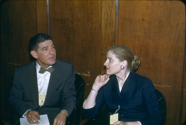 Edward Hollander is seated with an unidentified woman at an Americans for Democratic Action event.