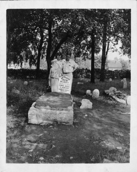 Anne and Carl Braden stand at the grave of her ancestor Ann Poague McGinty. McGinty was the first white woman to settle in Kentucky.