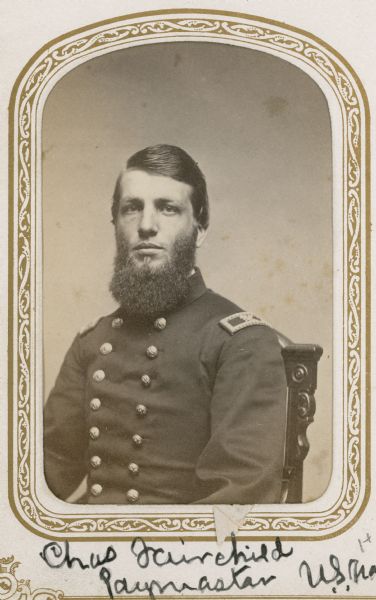 Waist-up studio portrait of Charles Fairchild in uniform. He was a paymaster in the U.S. Navy.