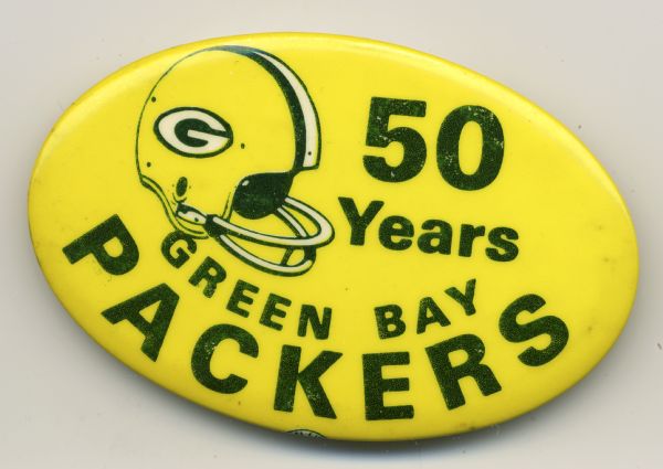 Pin celebrating 50 years of Green Bay Packers football. There is a picture of a Packer helmet on the pin.