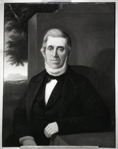 Waist-up seated portrait of Ebenezer Brigham.