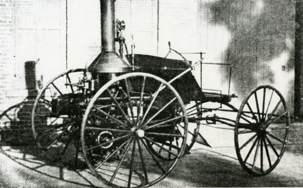 Automobile made by J. Wesley Carhart, Methodist minister of Racine, later of Oshkosh, Maryland and Texas. The vehicle was dismantled and the engine used to run a press.