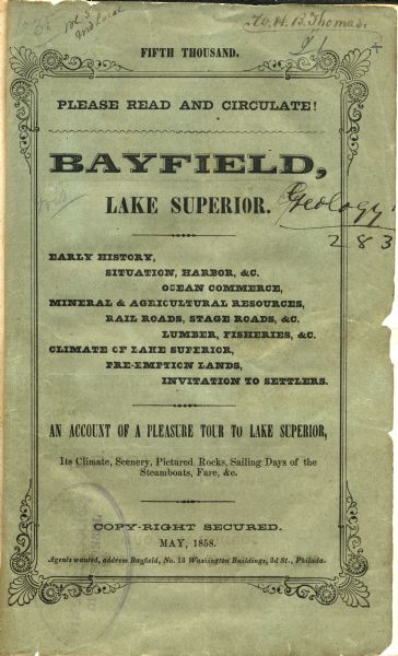 Front cover of a guide book describing Bayfield and an account of a pleasure tour to Lake Superior. The title is surrounded by a decorative border with flower patterns and scroll work at the corners.