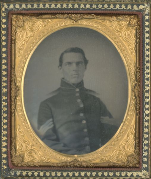 Sixth plate ferrotype/tintype of George Fairfield, facing forward with torso turned slightly right, in a military uniform with rank stripes on sleeves.
