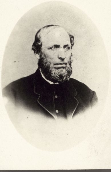 Quarter-length oval portrait of Jerome Case.