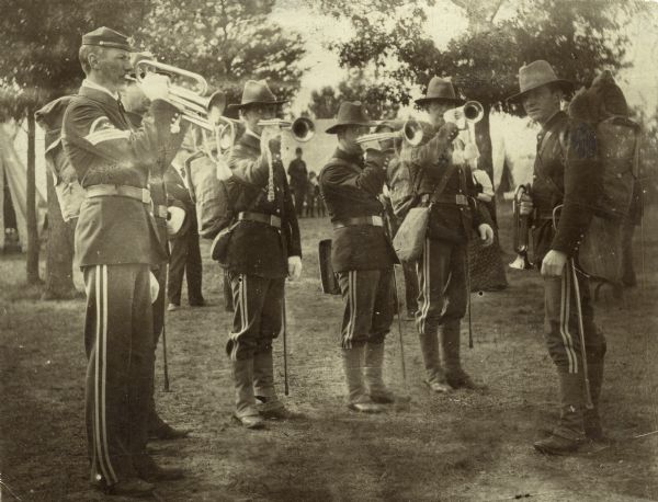 Members of the Wisconsin National Guard band pose with their instruments at Camp Douglas.