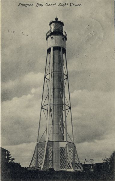Postcard view of the tower. Caption reads: "Sturgeon Bay Canal Light Tower."