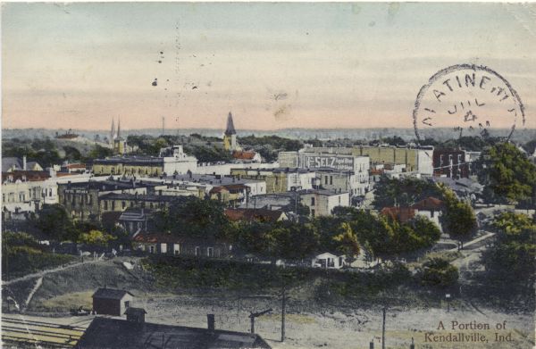 Hand-colored postcard view overlooking a portion of the town. Caption reads: "A Portion of Kendalville, Ind."