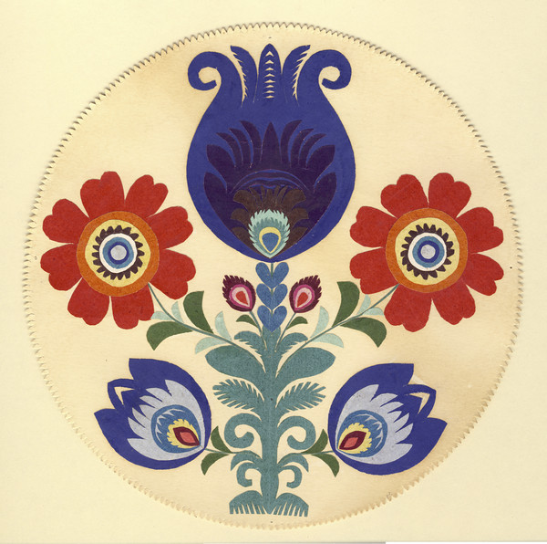 This is a Polish paper cutting, an art form known as wycinanki, featuring a floral/flower design.