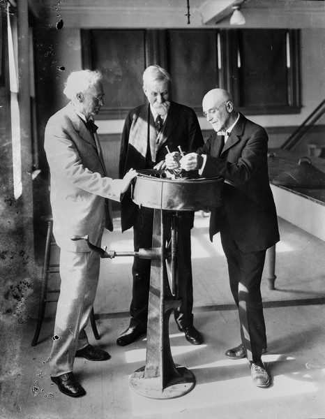 Dean W.A. Henry, University President Thomas C. Chamberlin, and Stephen M. Babcock with Babcock's butterfat testing device.