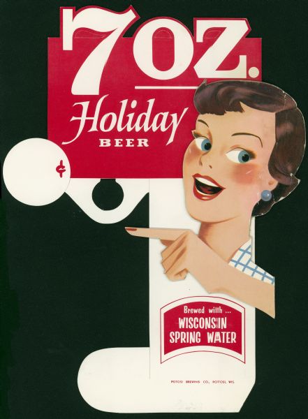 Die cut, scored advertising display card, of unfolded cardboard, with two pieces glued together. Includes an illustration of a woman pointing to a spot which would display a beer bottle when the card was folded to provide a stand.