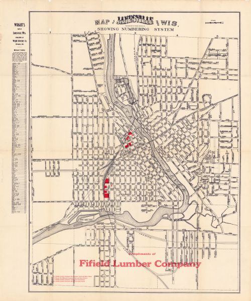 This map of Janesville was distrusted by the Fifield Lumber Company and features labeled streets, the Rock River, and Fifield Lumber Company buildings in red. To the top left of the map is a street index with streets listed alphabetically. The scale is given in the top right corner.