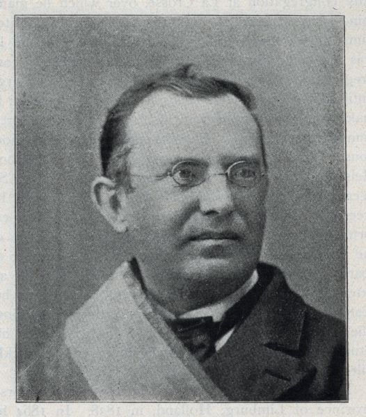 Head and shoulders portrait of Reverend Leo Suchy.