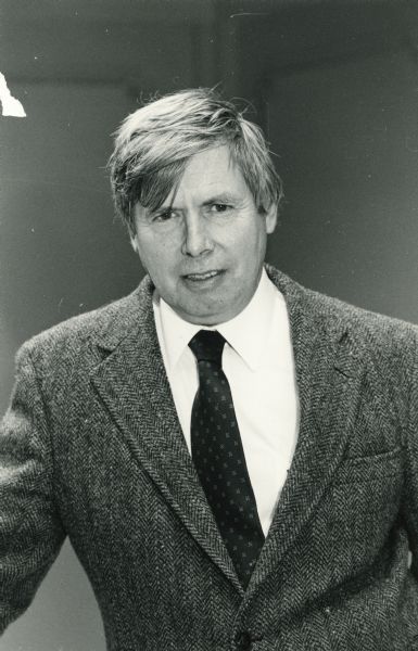 Waist-up staff portrait of F. Gerald Ham, State Archivist of Wisconsin from 1964 to 1989 and the head of the Division of Archives and Manuscripts at the State Historical Society of Wisconsin. F. Gerald Ham wrote a number of influential practical and academic works on the field of archives during his career.