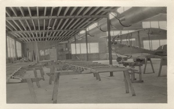 Photographic postcard showing the assembly hangar for the Lawson Military Tractor 2 (M.T.2).