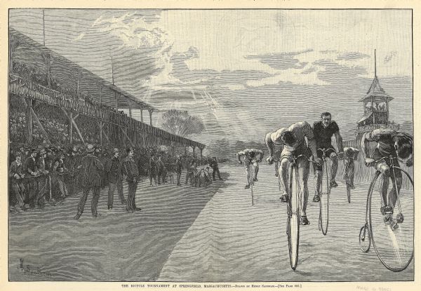 Engraved image of a drawing by Henry Sandham showing six bicycle racers on a track with a large crowd of spectators in the stands and along the side of the track at left. The judge's stand is on the at right.
