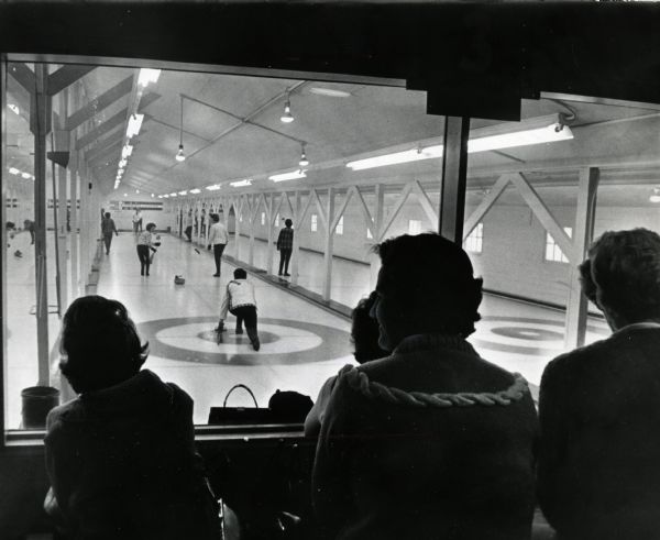Spectators view of a curling match at Riverside Park.