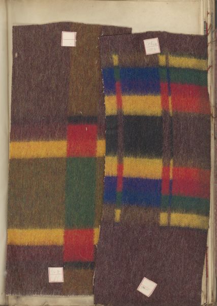 Colorful patterned wool fabric in an Appleton Woolen Mills sample book.