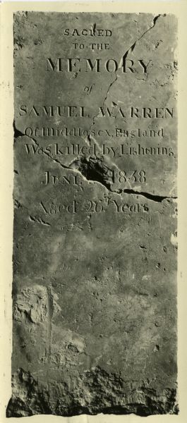 Grave marker for Samuel Warren of Middlesex, England, who was killed by lightning in June of 1838 at the age of 26. Warren was buried in what was the first cemetery in Madison and is now known as Bascom Hill.