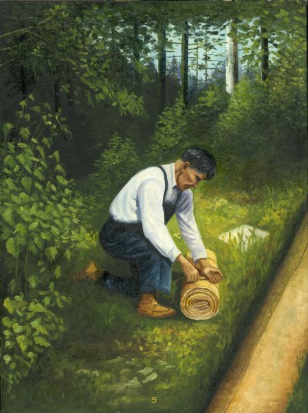 An Ojibwa man kneels on the ground to roll up cedar bark that will be used in the construction of a canoe.
