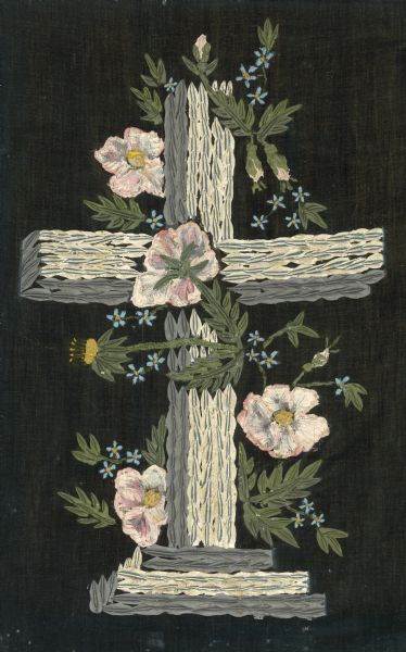 Black velvet painting of a memorial cross, with flowers.