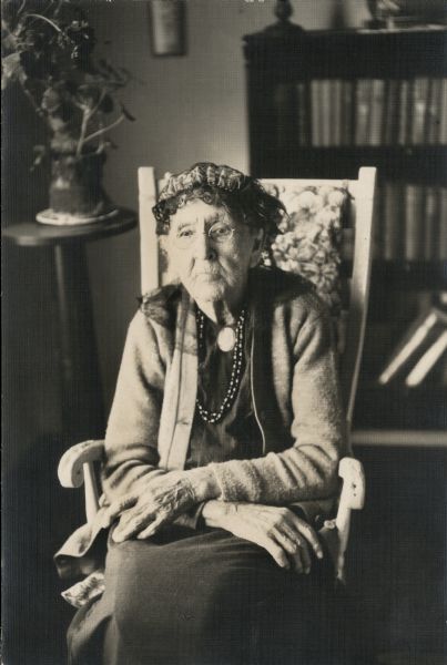 Portrait of Julia Warren Spears, sitting in a rocking chair at age 92.