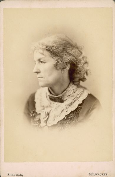 Vignetted head and shoulders portrait of Lydia Ely, a well-known artist, humanitarian and promoter of the arts in the late 19th century.