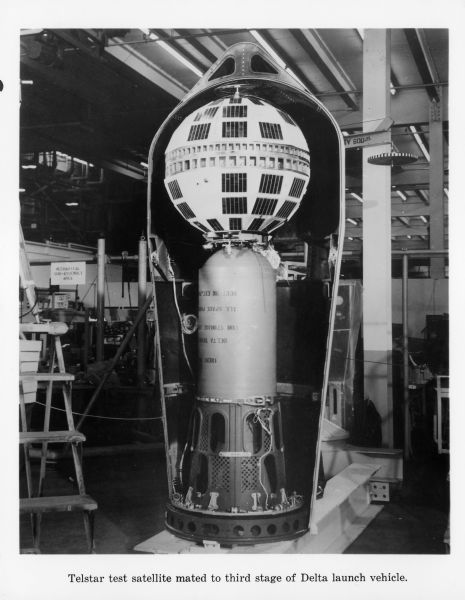 A Telstar test satellite mated to the third stage of Delta launch vehicle.