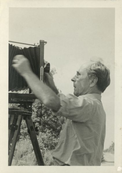 Edward Weston setting exposure on his 8 x 10 camera at Highlander Folk School in New Market,Tennessee.